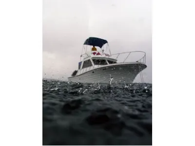 Rain Doesnt Stop Divers — West End, Roatan, Honduras