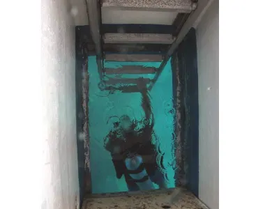 Center Well, Diver Below — Roatan Island, Honduras – CoCo View Resort